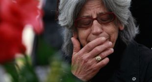 60-year-old Greek musician and his 91-year-old mother jump to their deaths because of financial crisis