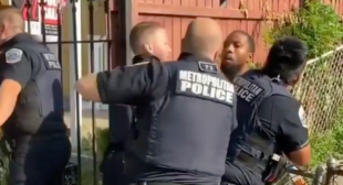 Viral video shows DC cop punching a Black man 12 times as other officers let him