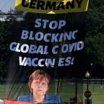 'Stop Blocking Global Covid Vaccines': Protests Greet Merkel's White House Visit