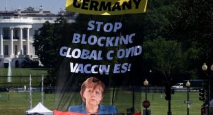 ‘Stop Blocking Global Covid Vaccines’: Protests Greet Merkel’s White House Visit